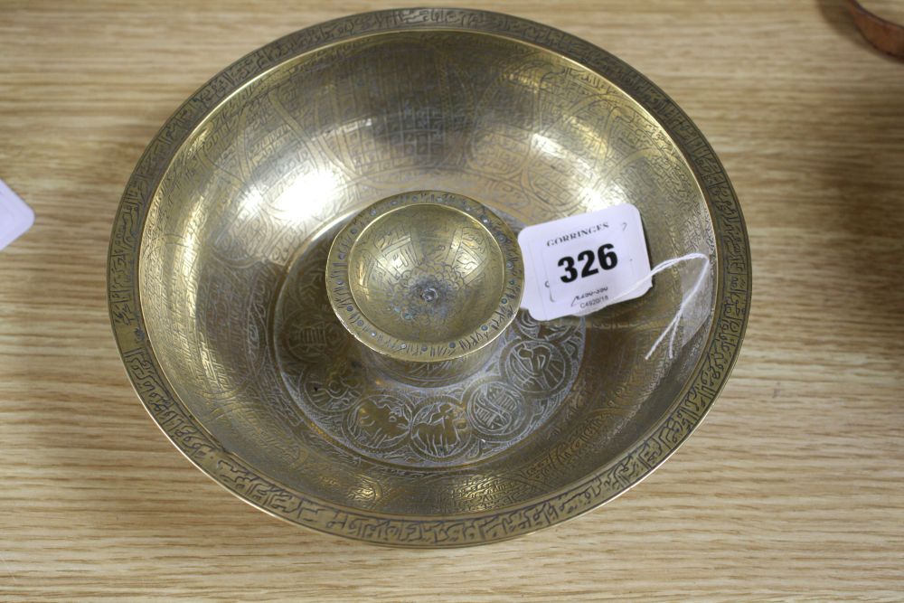 A large brass Persian magic bowl, Qajar dynasty, Diam. 8.25in.